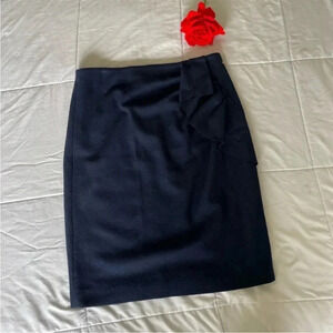 Carolina Herrera navy ruffle midi skirt